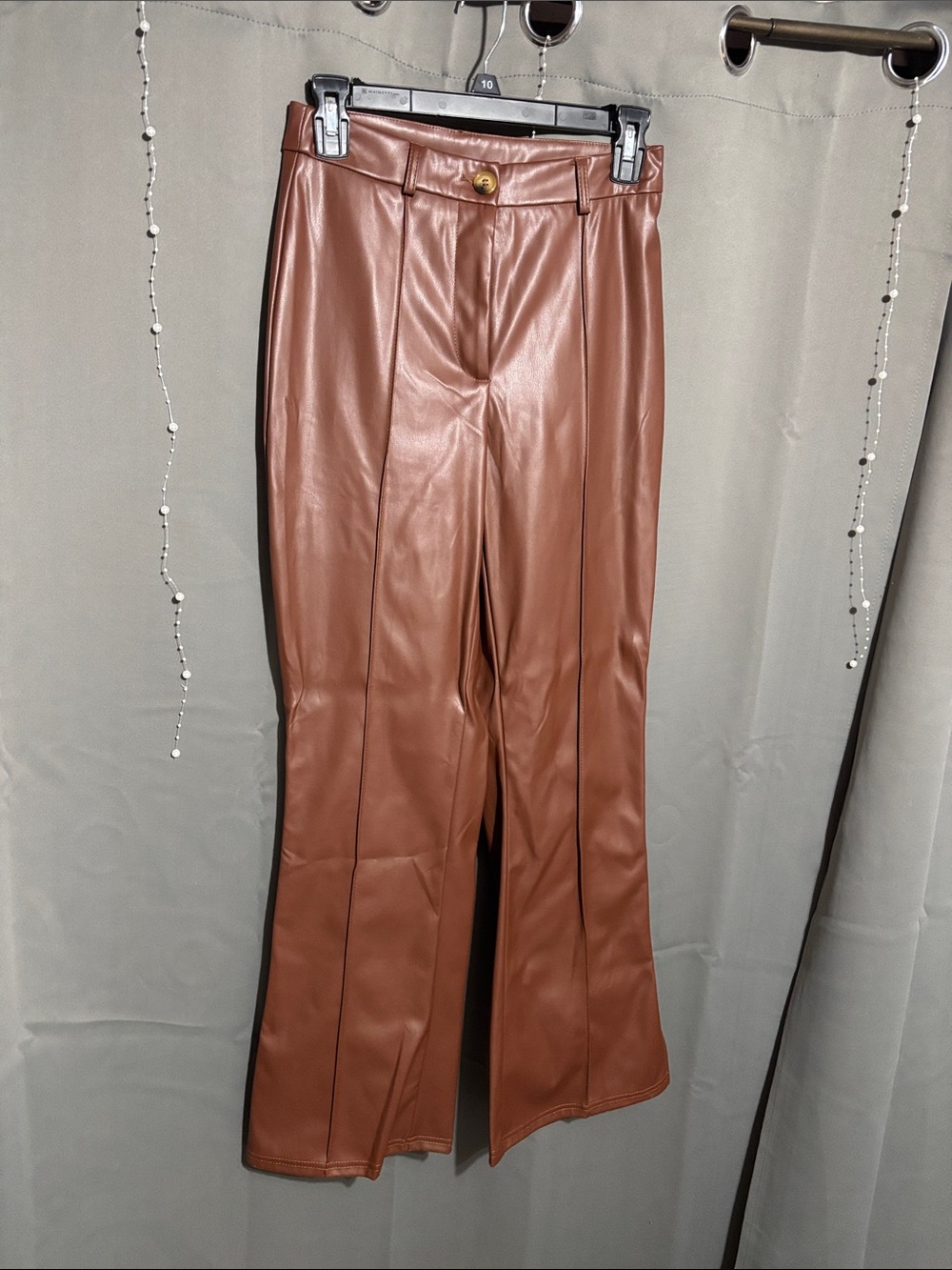 Faux leather flared jeans